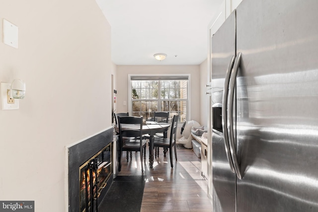 dining area with dark wood-type flooring