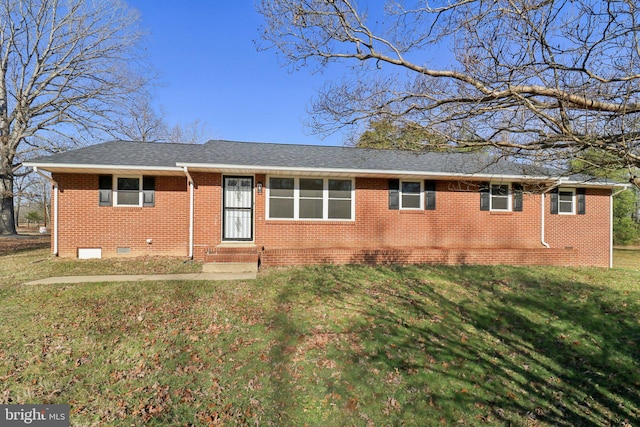 ranch-style house featuring a front lawn