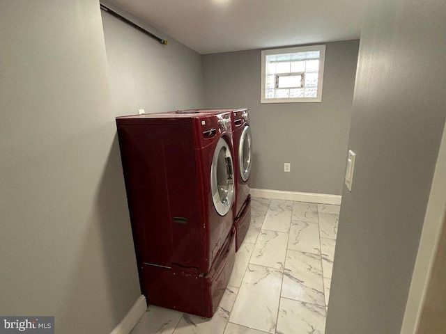 laundry room with separate washer and dryer