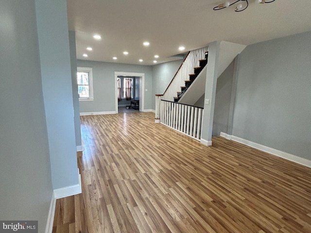 unfurnished living room featuring light wood-type flooring