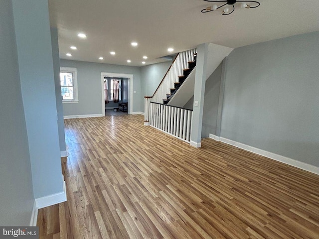 unfurnished living room with light hardwood / wood-style floors