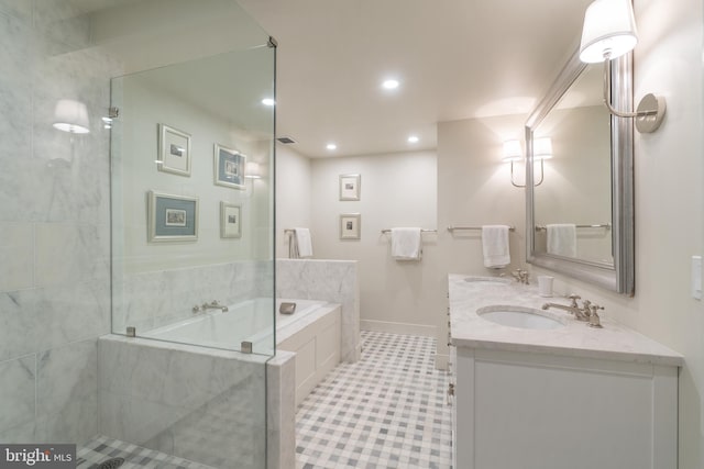 bathroom featuring tile patterned floors, vanity, and independent shower and bath