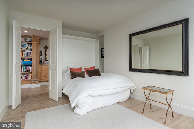 bedroom featuring hardwood / wood-style flooring