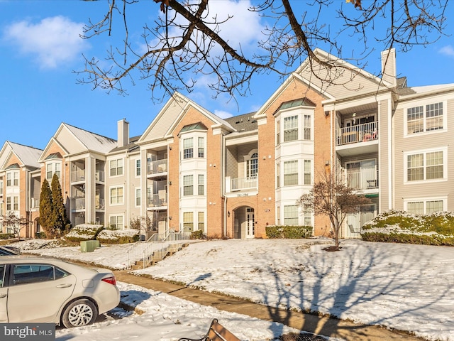 view of snow covered building