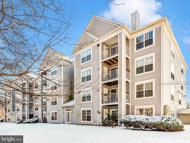 view of snow covered building