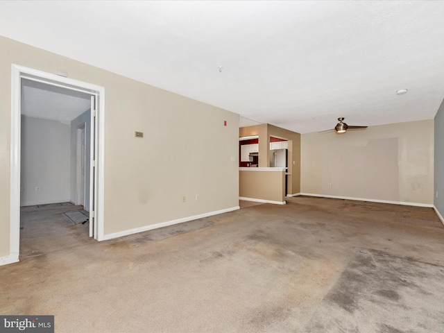 unfurnished living room with carpet