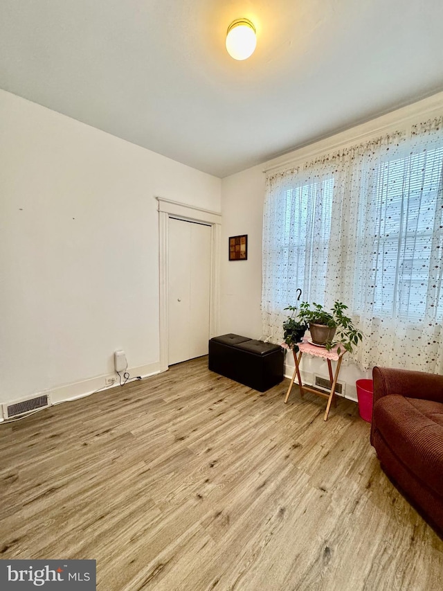 living area featuring light hardwood / wood-style flooring