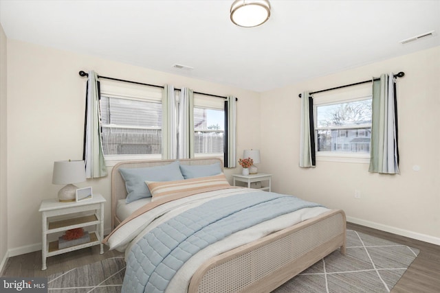 bedroom featuring dark hardwood / wood-style floors