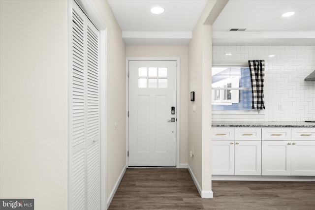 foyer featuring dark hardwood / wood-style flooring