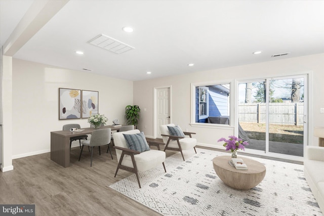 living area featuring light hardwood / wood-style floors