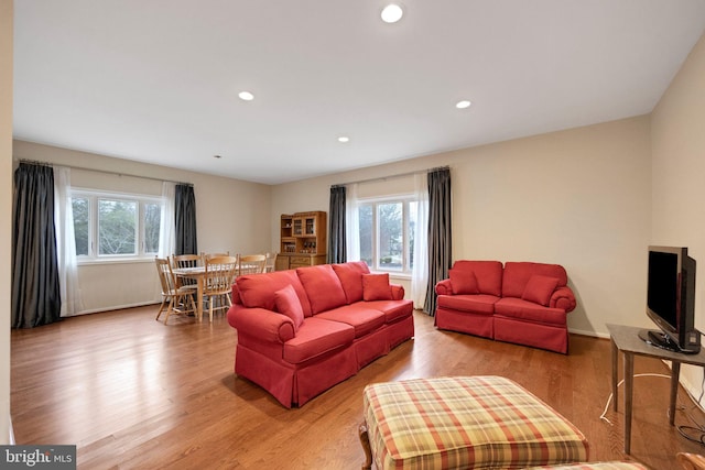 living room with light hardwood / wood-style floors