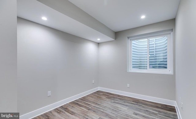 empty room featuring wood-type flooring