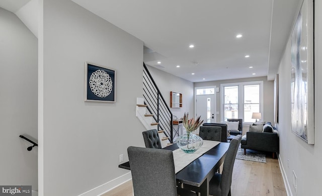 dining space with light wood-type flooring