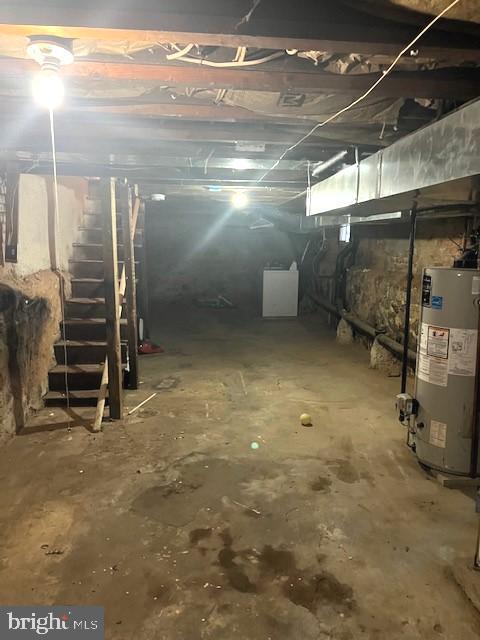 basement featuring gas water heater