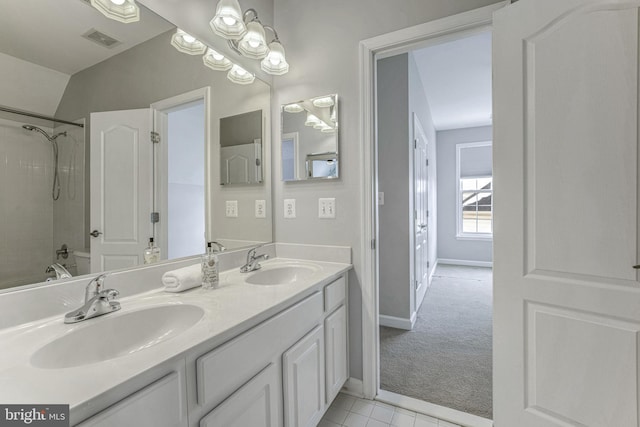 bathroom featuring vanity and shower / bathtub combination