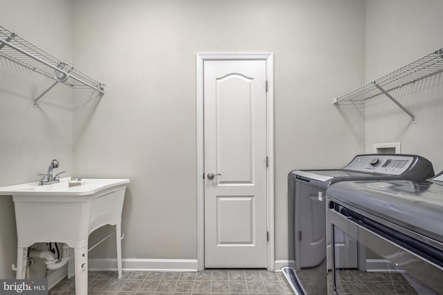 laundry room featuring washing machine and dryer