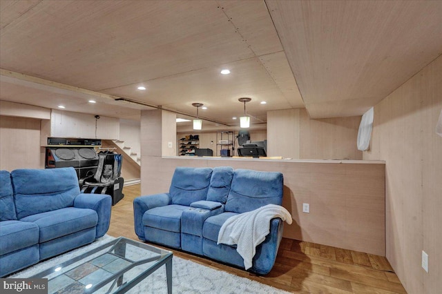 living room with light hardwood / wood-style flooring