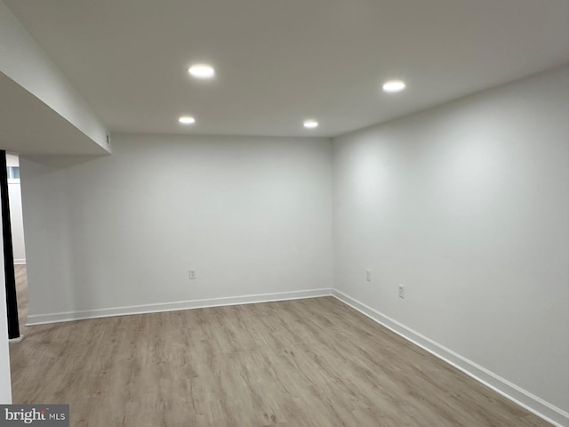 unfurnished room featuring light wood-type flooring