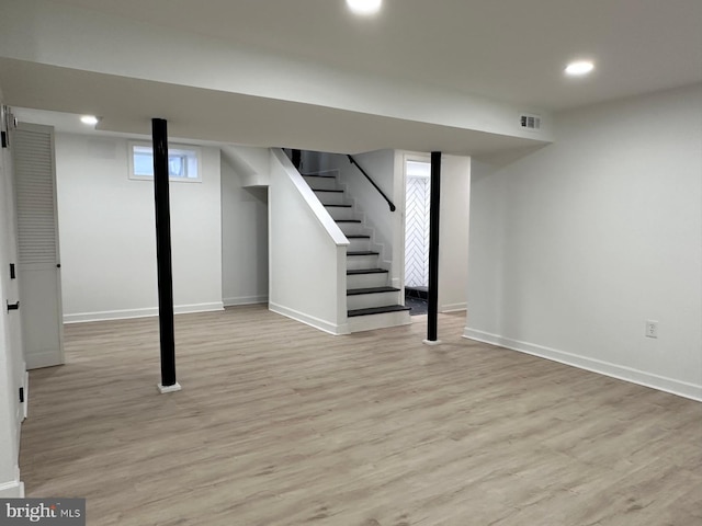 basement with light wood-type flooring