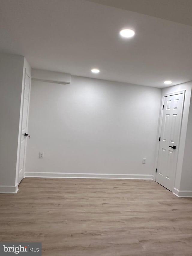 basement with light wood-type flooring