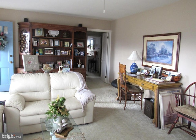 living room featuring light colored carpet