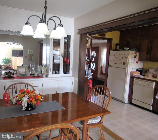 dining room featuring an inviting chandelier