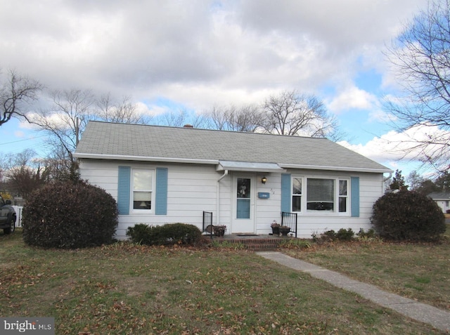 view of front of house with a front lawn