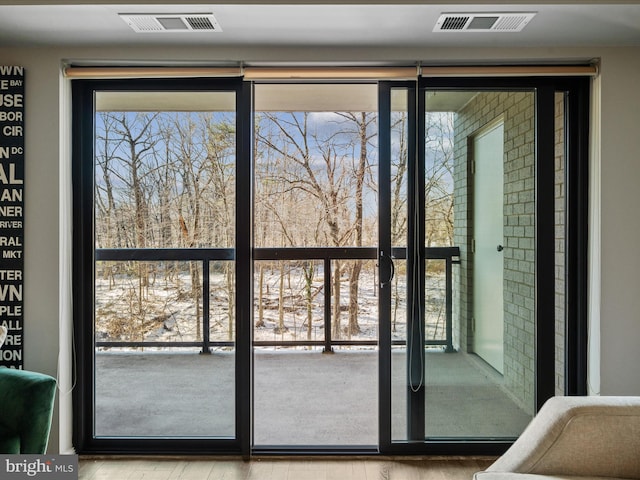 doorway featuring light hardwood / wood-style floors