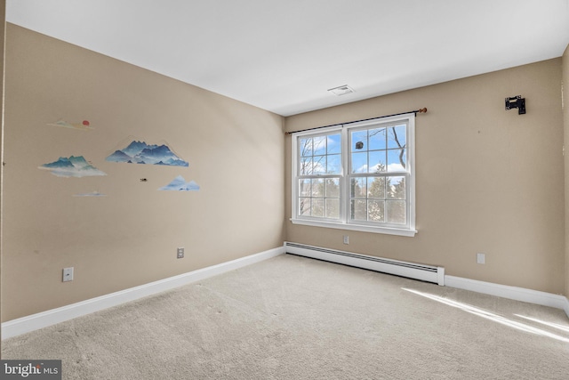 carpeted empty room featuring a baseboard radiator