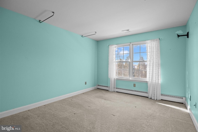 unfurnished room featuring light colored carpet and a baseboard radiator