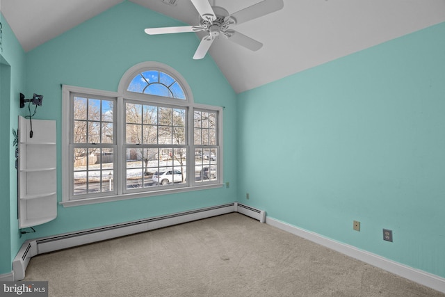 carpeted empty room featuring baseboard heating, ceiling fan, and vaulted ceiling