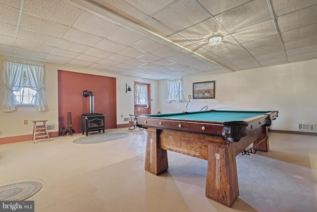 playroom with a wood stove, a drop ceiling, and pool table