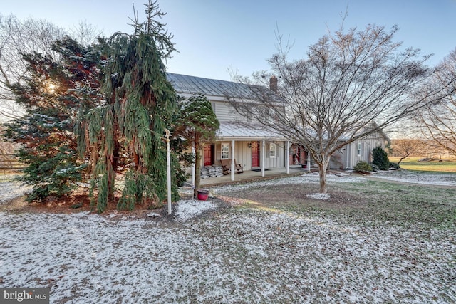 obstructed view of property featuring a porch