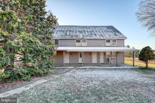 farmhouse-style home with covered porch