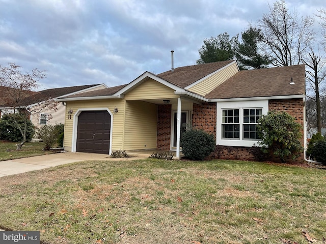 single story home with a garage and a front yard