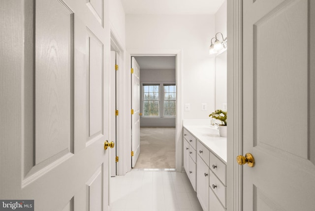 bathroom with vanity and tile patterned floors