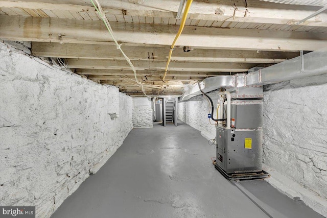 basement featuring heating unit