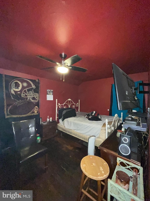 bedroom with hardwood / wood-style flooring and ceiling fan