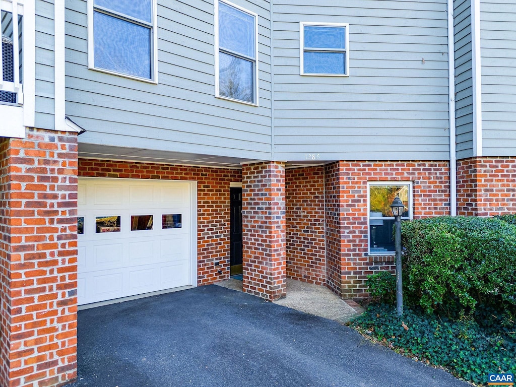 exterior space featuring a garage