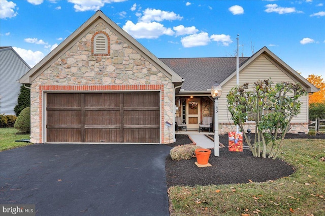 view of front of home with a garage