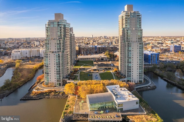 property's view of city with a water view