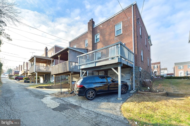 exterior space with a carport