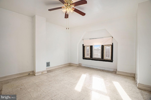 spare room featuring ceiling fan