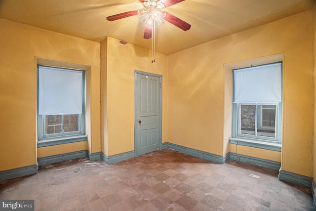 empty room with ceiling fan