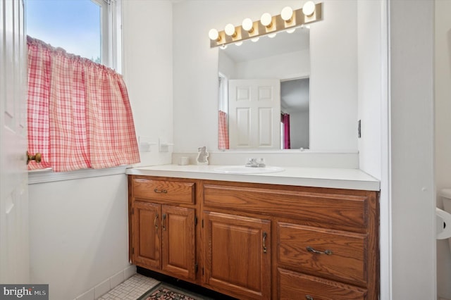 bathroom featuring tile patterned floors and vanity