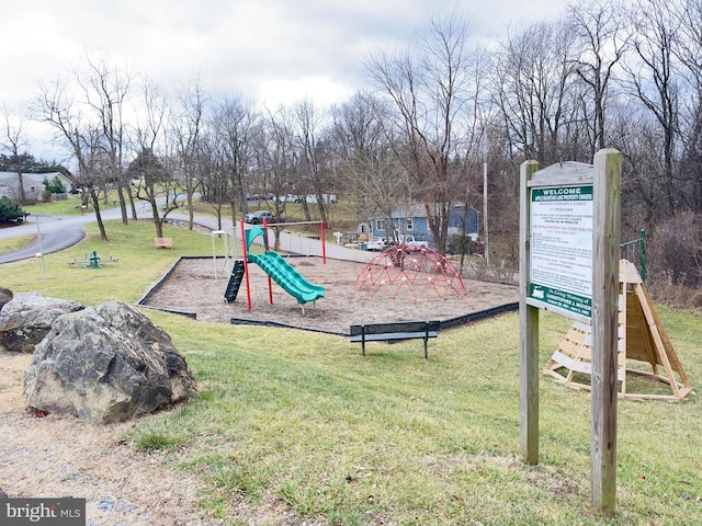 view of playground featuring a yard