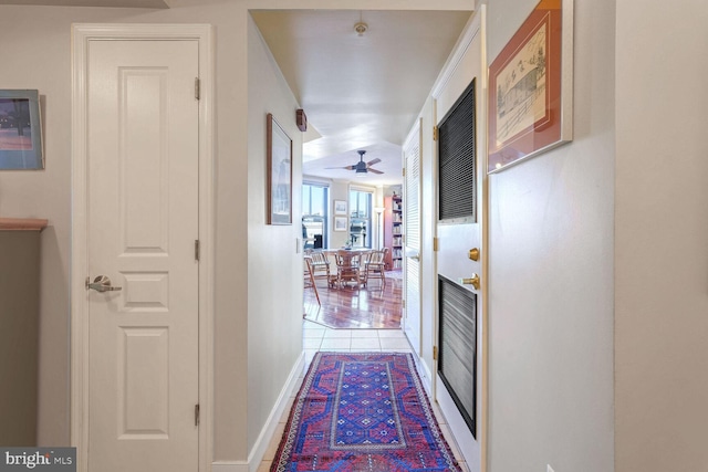 hallway with light tile patterned floors