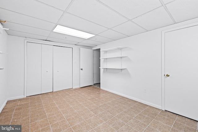 basement with a drop ceiling