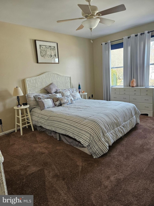 carpeted bedroom featuring a ceiling fan