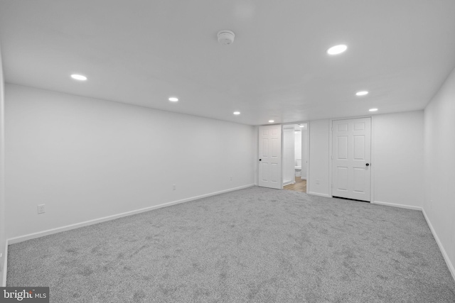 basement with carpet flooring